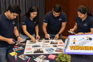 Employees creating vision boards with images, goals, and inspirational messages during a personal development workshop.